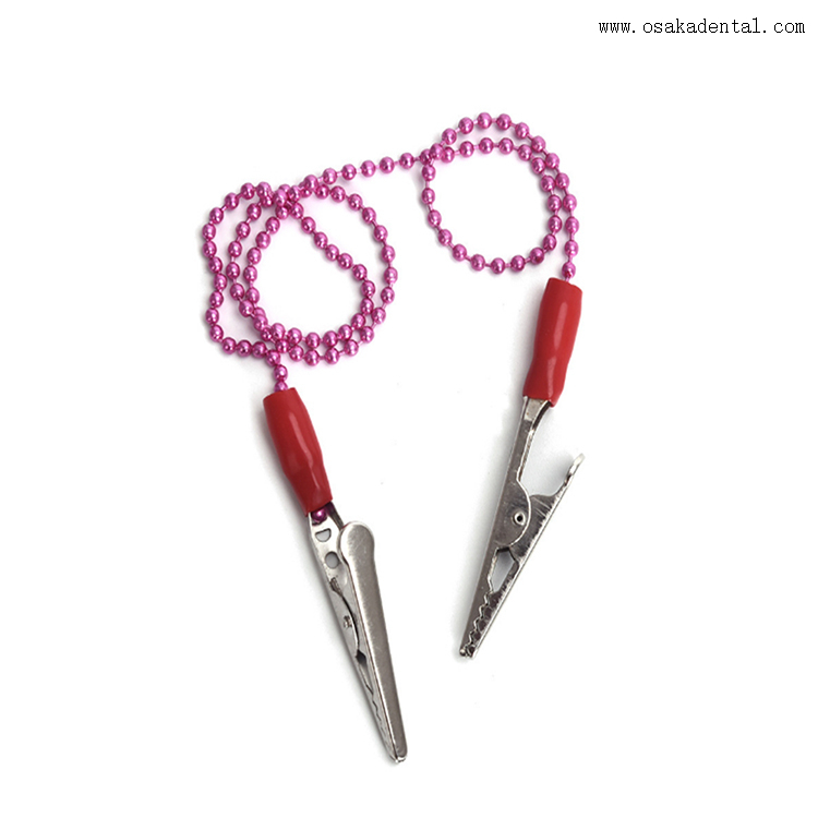 Porta-babador disponível odontológico com clipe de metal