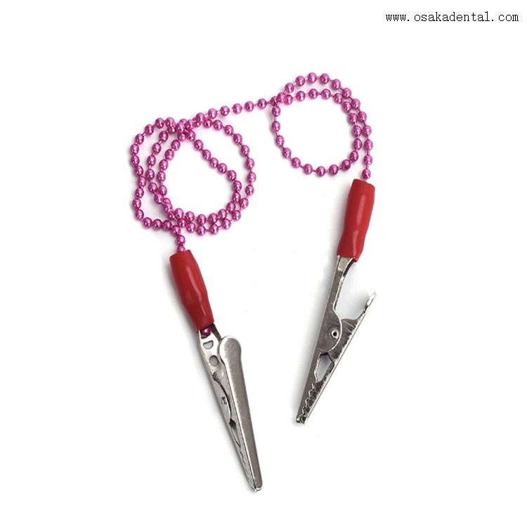 Porta-babador disponível odontológico com clipe de metal