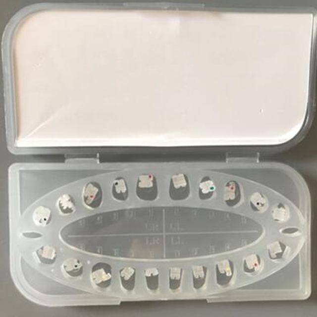 Elástico de suporte ortodôntico cerâmico dentário