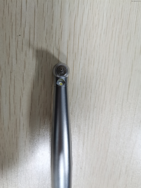 Handpiece dental de alta velocidade com botão gerador de luz e handpiece dental