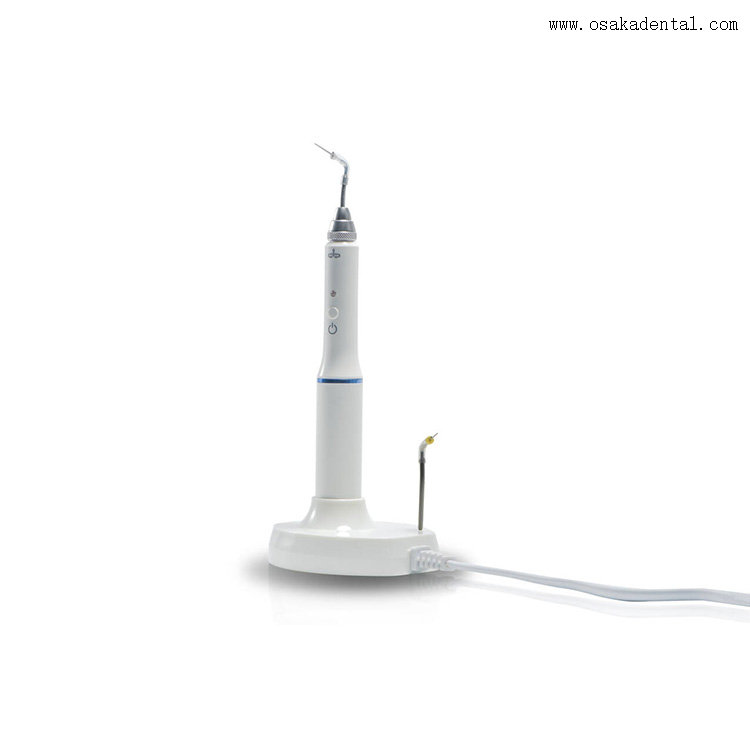 Caneta de obturação dentária que pode ser conectada ao pino de aquecimento na base