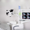 Microscópio dental do equipamento dental com câmera instala na unidade dental